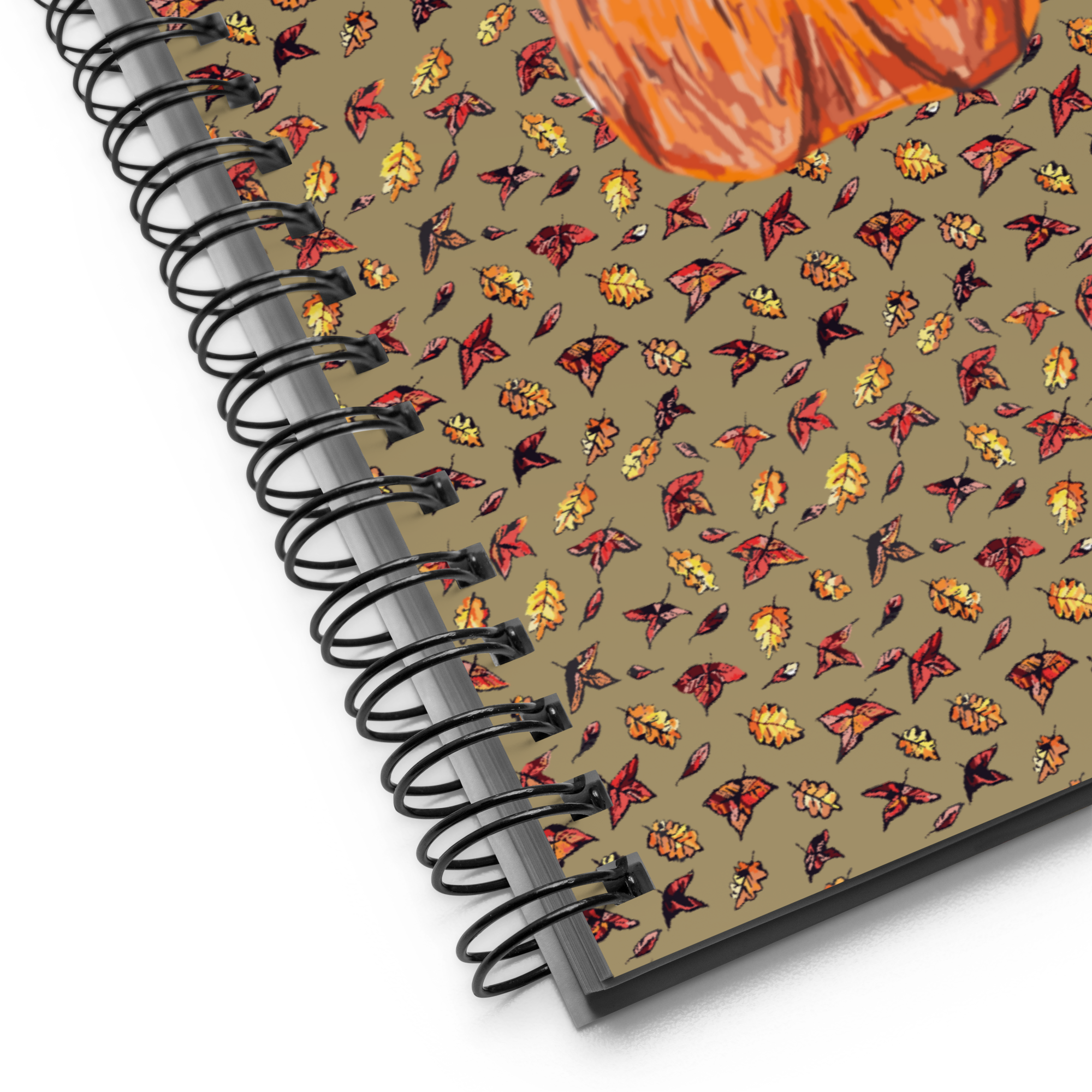 Close-up of the Pumpkin Season bullet journal cover with autumn leaf pattern and wire binding