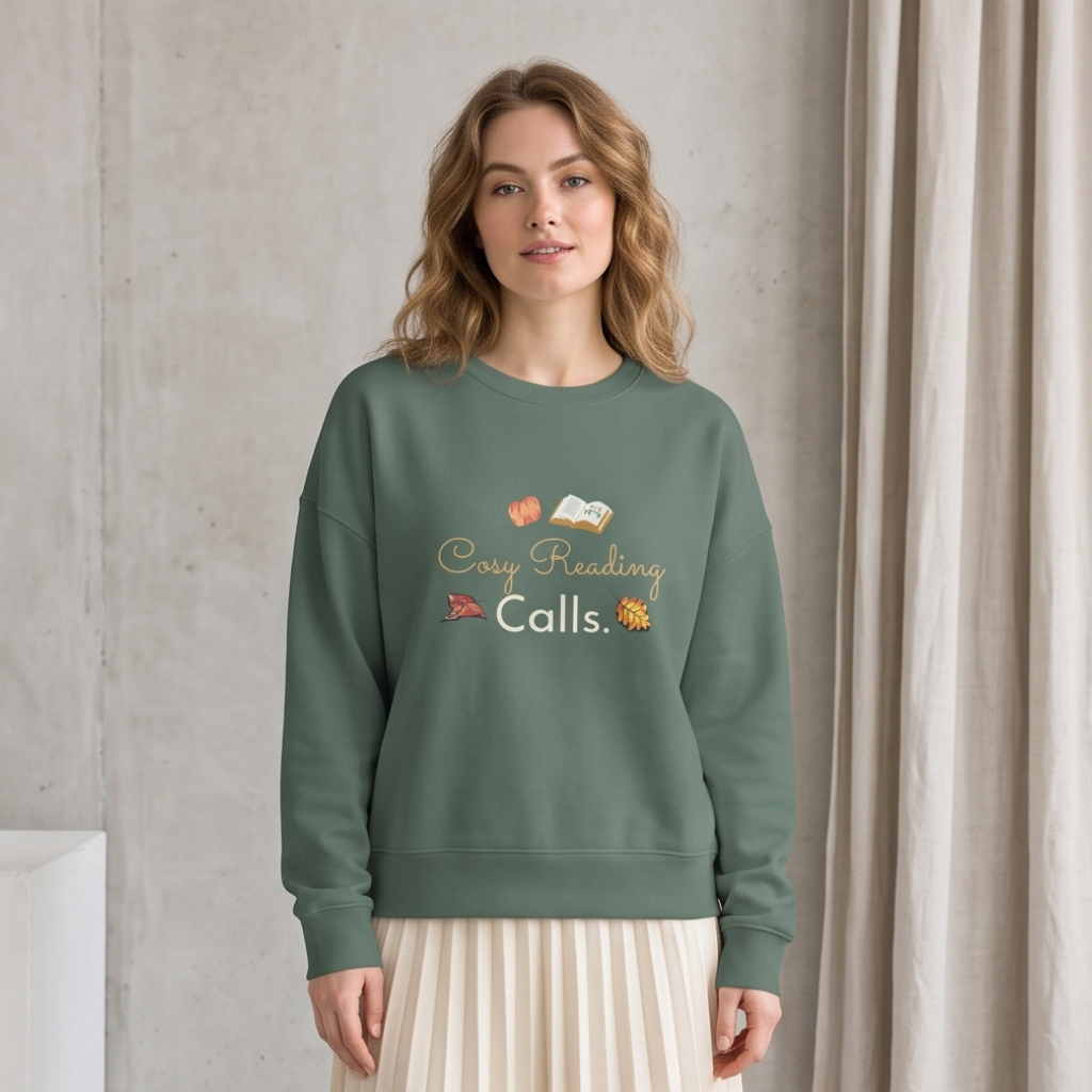 Woman wearing the green 'Cosy Reading Calls' sweatshirt