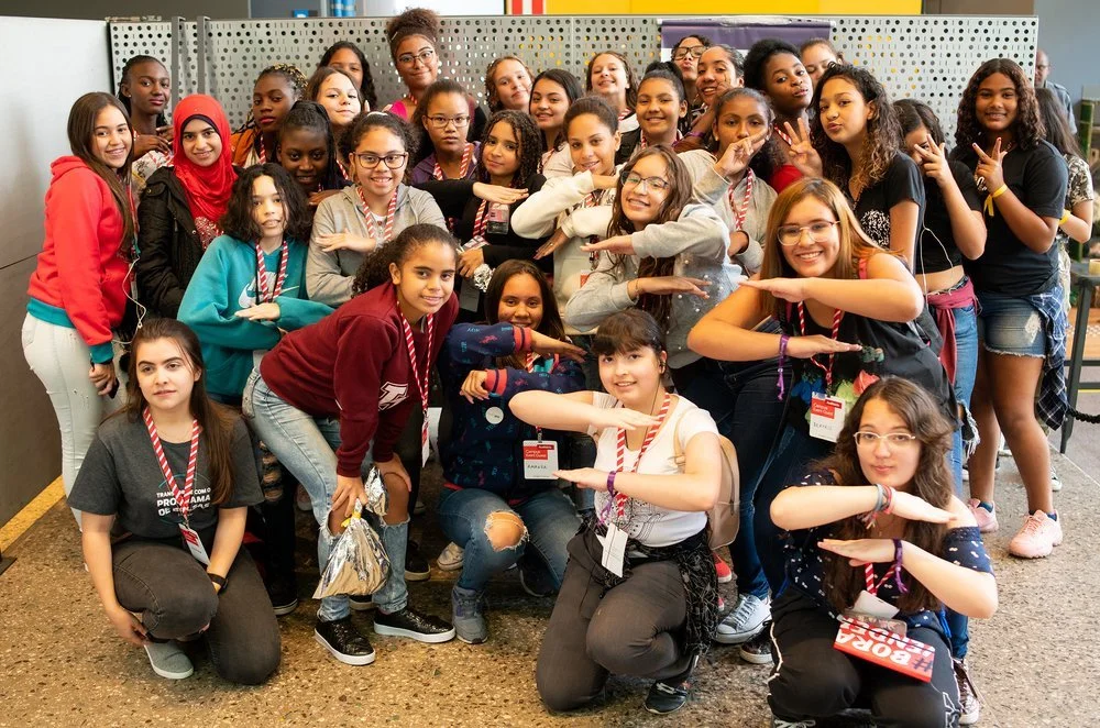A large group of teenage girls, posing together during an Inspiring Girls event.