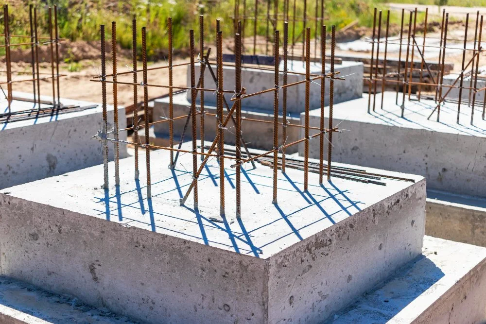 monolithic-reinforced-concrete-foundations-construction-residential-building-grillage-construction-site-construction-pit-with-foundations.jpeg