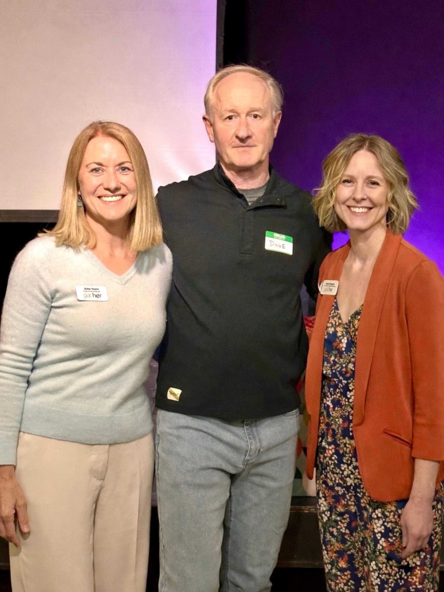 Gather executive director, Anne Hayes, 2026 Volunteer of the Year - Dave Erickson, and Gather Volunteer program manager, Steph Pelligrini