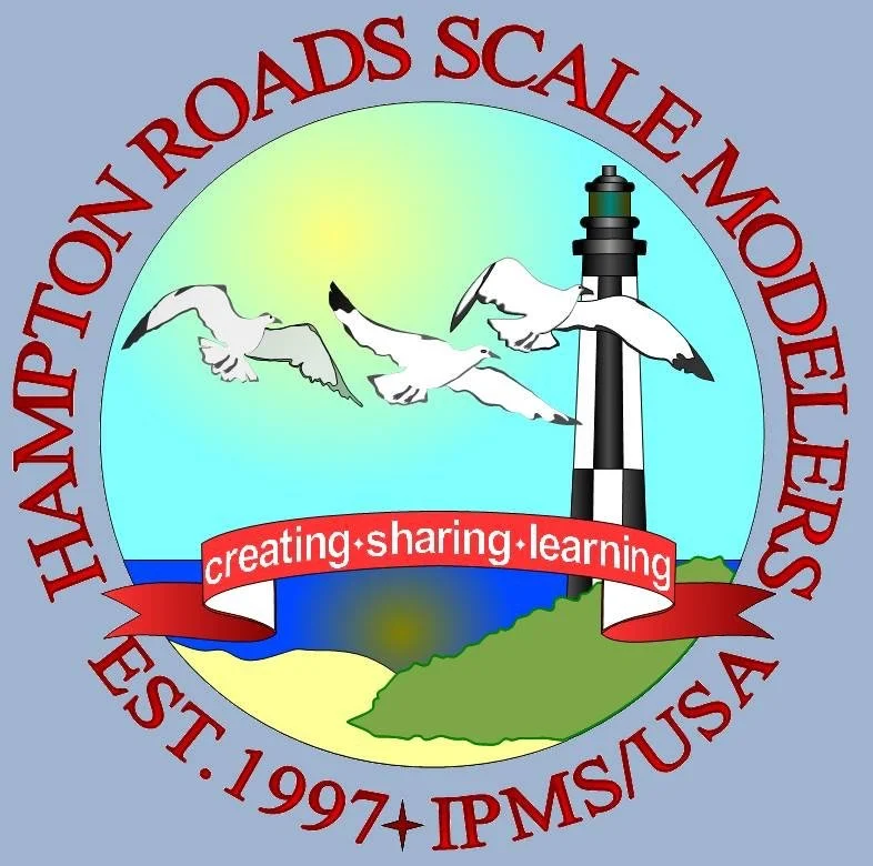 Logo for Hampton Roads Scale Modelers, established in 1997, featuring a lighthouse, three flying seagulls, a lake, and green hills, with the words 'creating sharing learning' on a red banner.