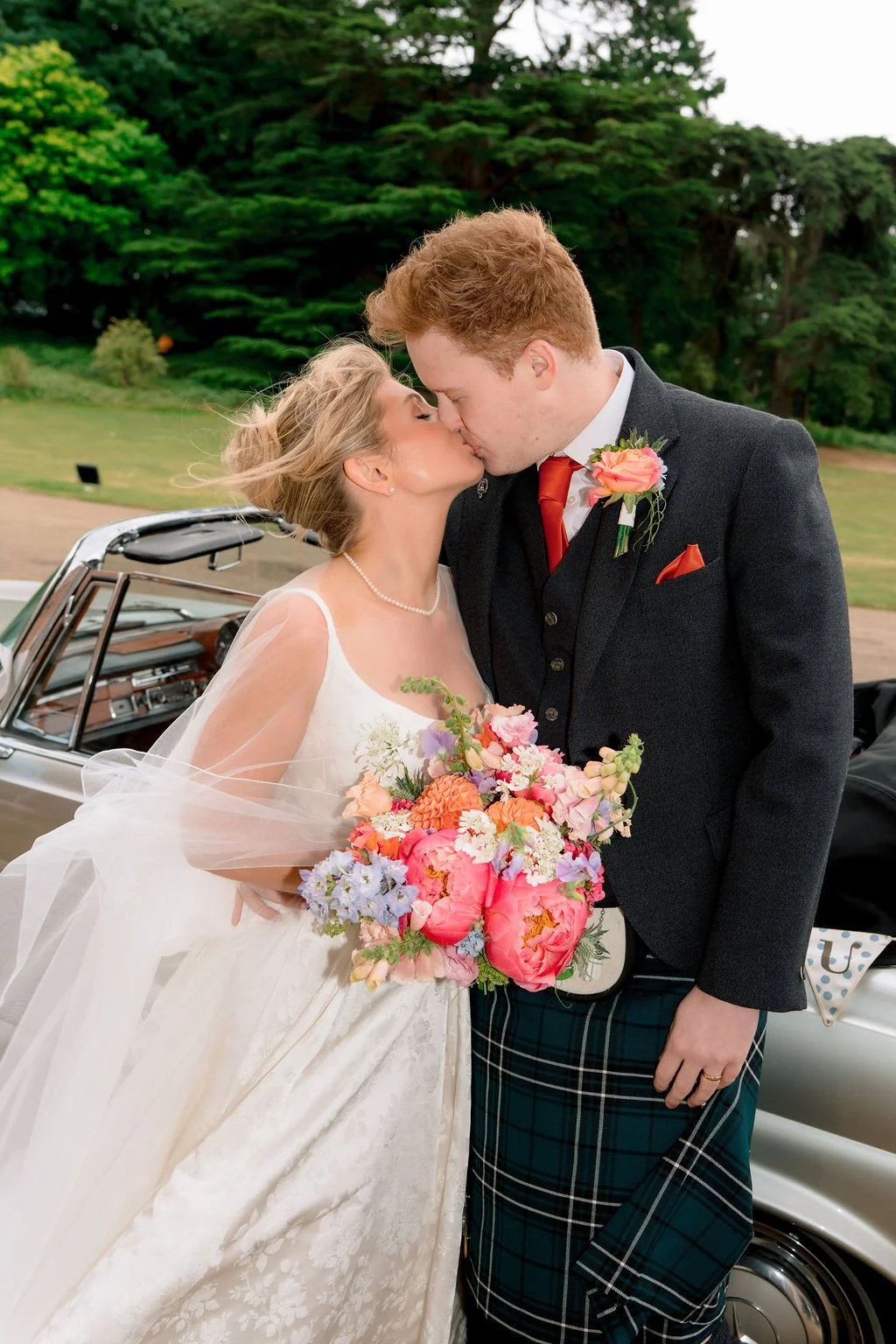 Coral wedding flowers British flowers Brocket Hall