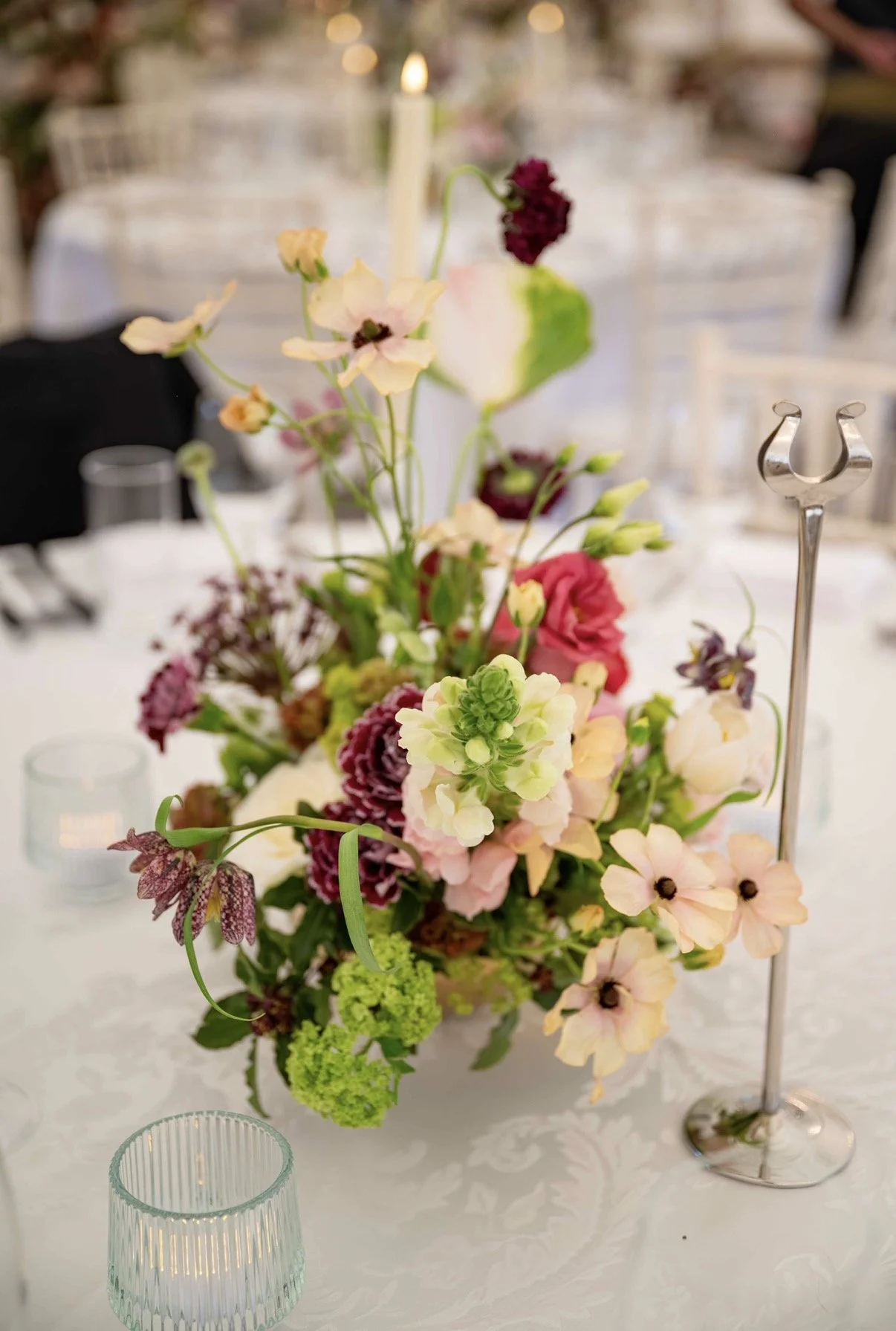 Table centre burgundy wedding flowers