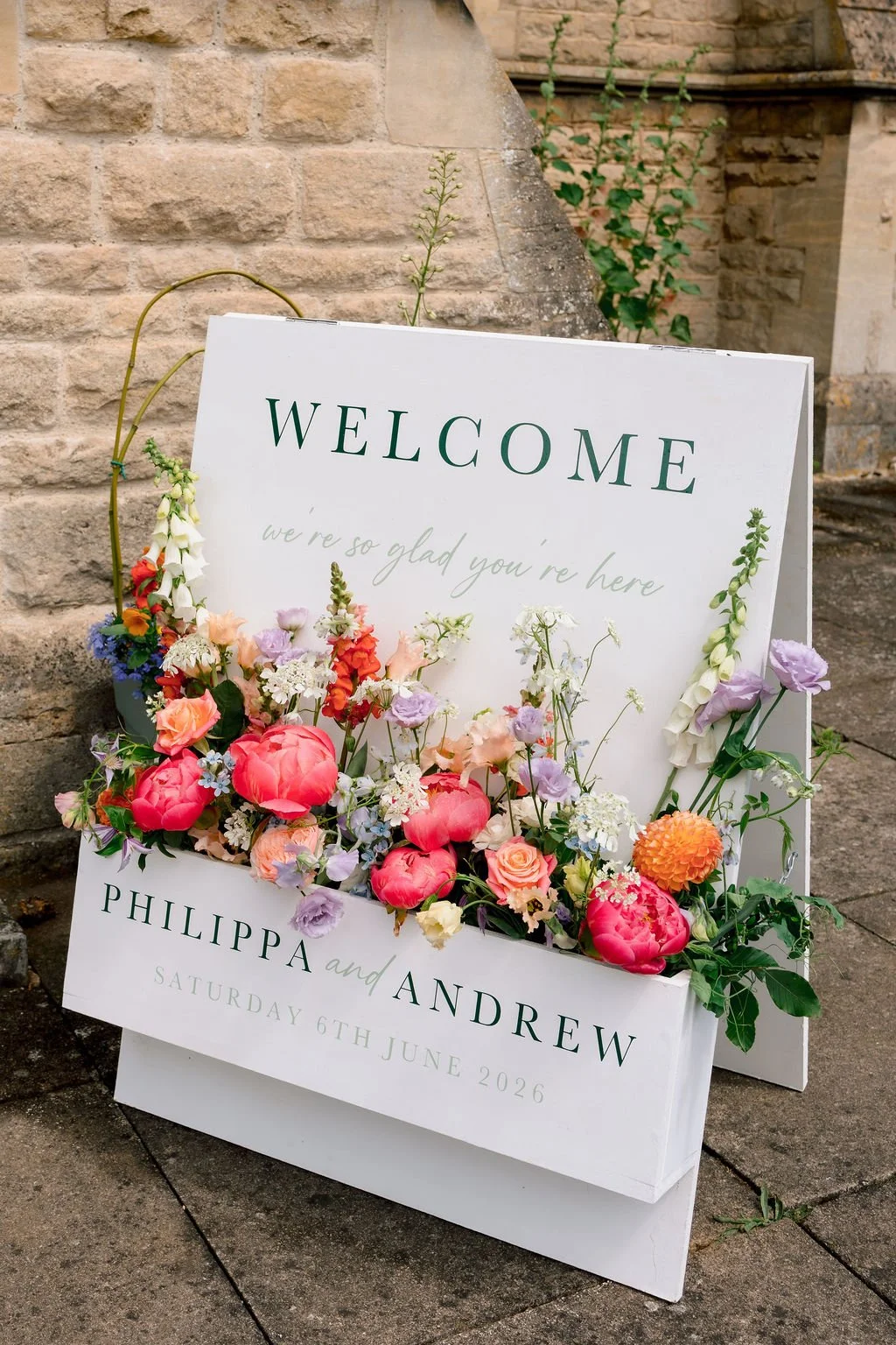 Welcome sign flowers coral