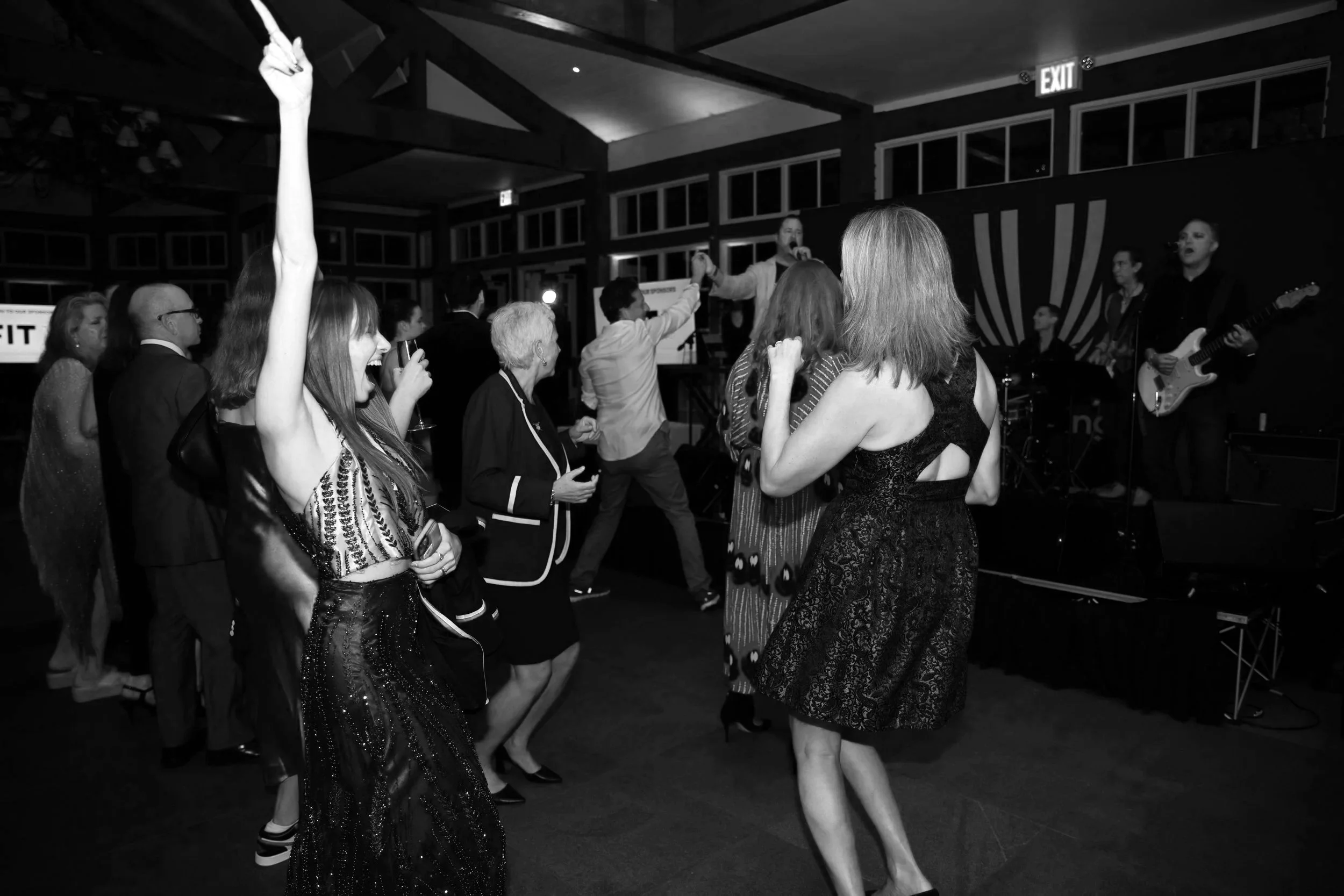 People dancing and enjoying live music at a Row New York fundraising event, produced by JKM Events.