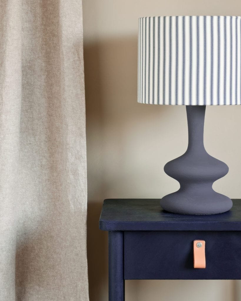 Oxford-Navy-side-table-curtain-in-Linen-Union-in-Old-White-French-Linen-lamp-base-in-Old-Violet-lampshade-in-Ticking-in-Old-Violet-1600.jpg