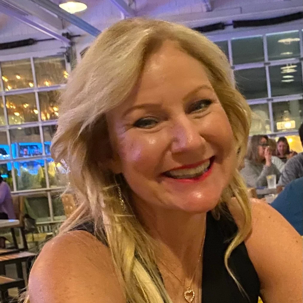 blonde hair woman smiling close up headshot