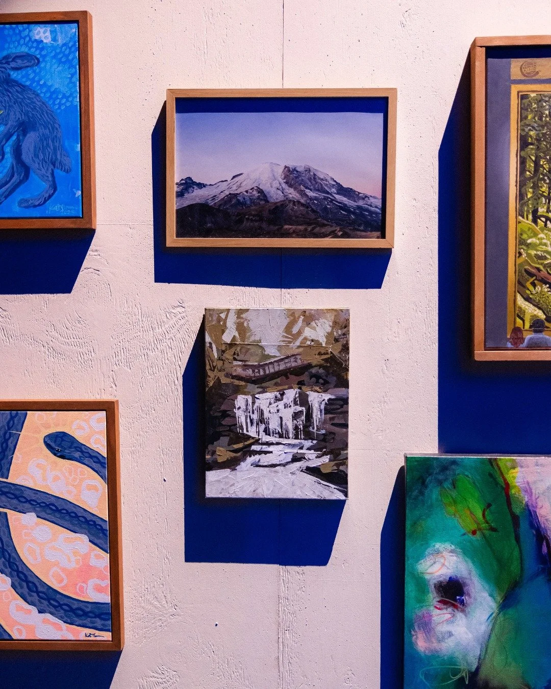 Thank you so much to Art House WV and to all the contributing artists who made our on-stage gallery shine ✨

 @art.house.wv curated a great selection of art from the Mountain State, featuring work by:

 @tadlocka 
 @bckwrdsmax 
 @fruitful_wild 
 @bet