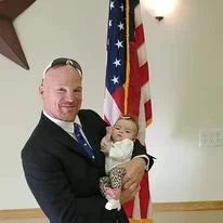 mike holding baby.jpg