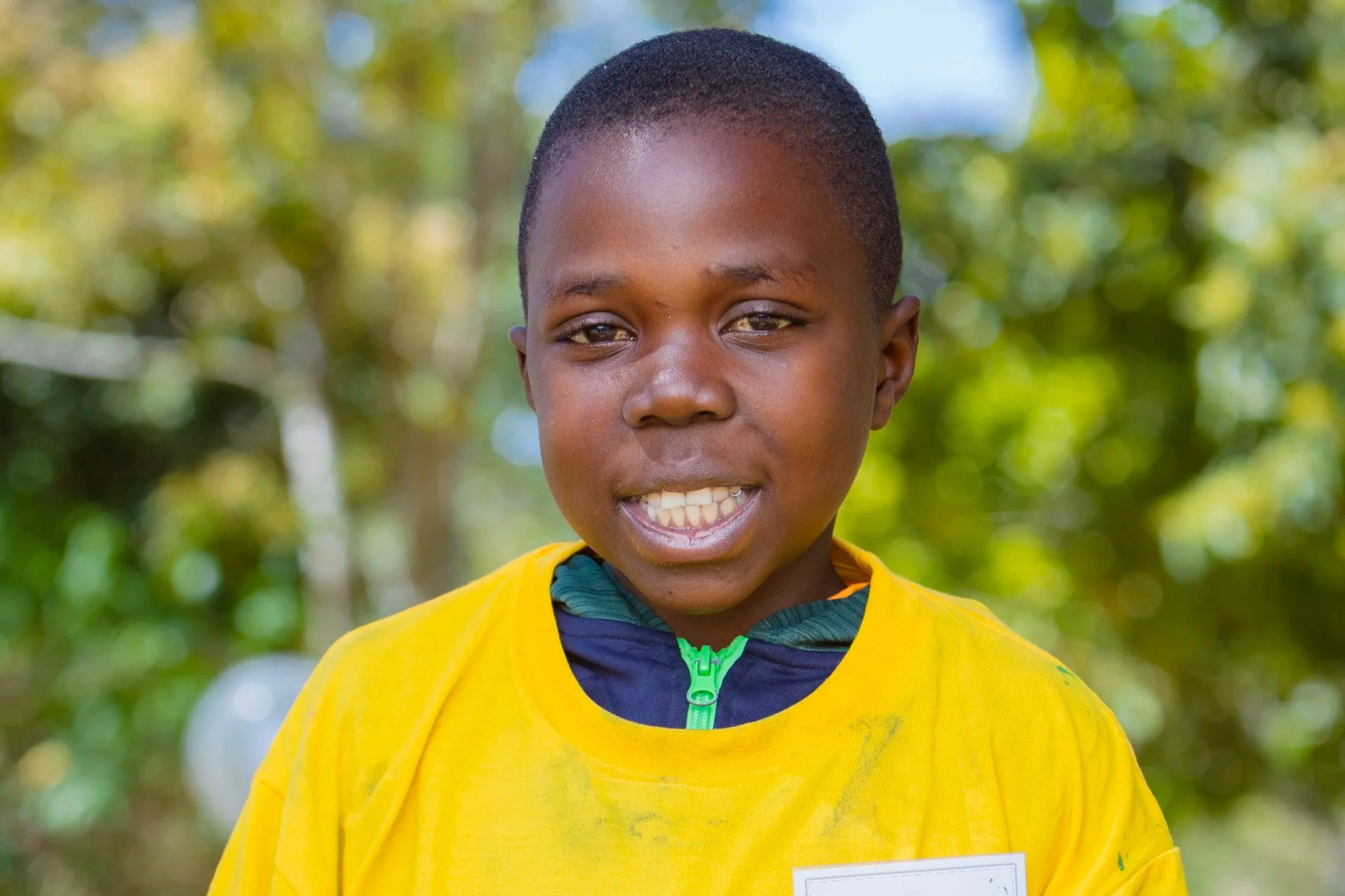  Daniel Mulowa smiles for a portrait. (Photo: DOD Media Hub) 