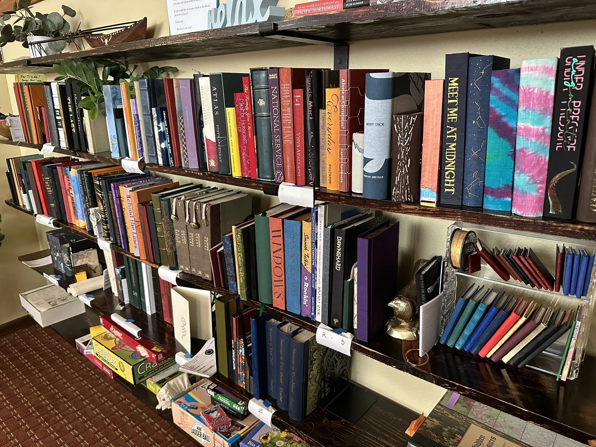 Three shelves of handmade books