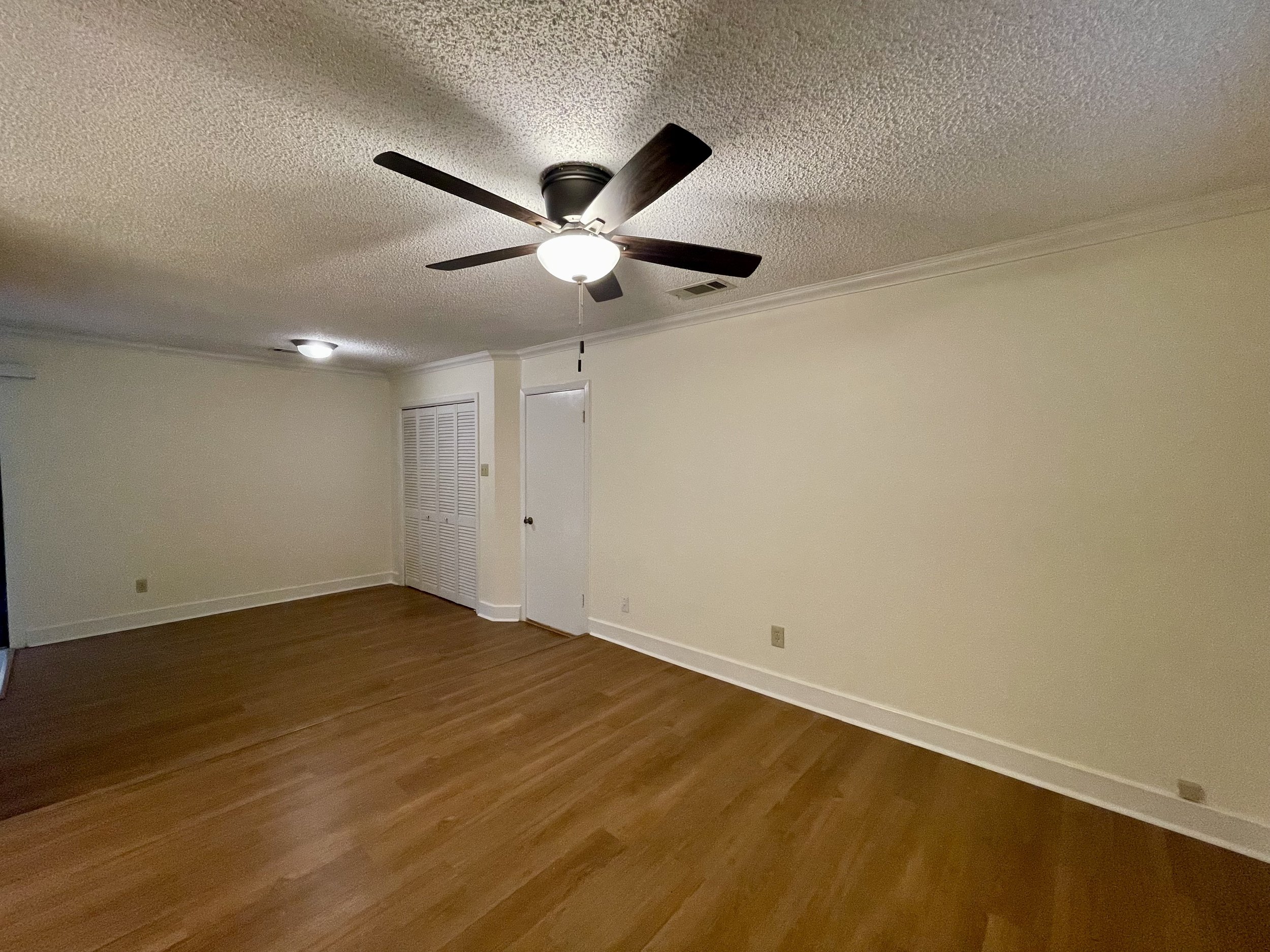 Primary bedroom has two closets.