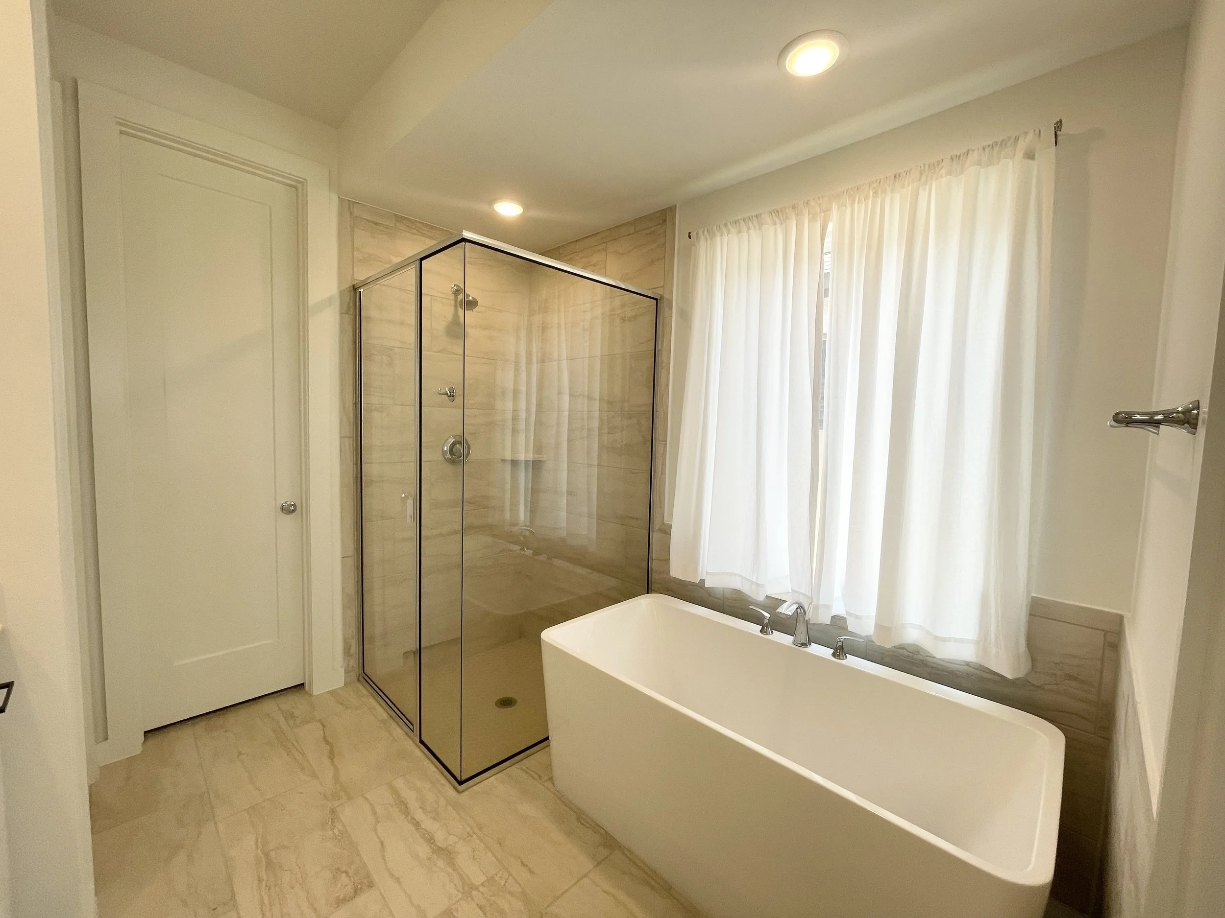 Standalone garden tub and separate shower