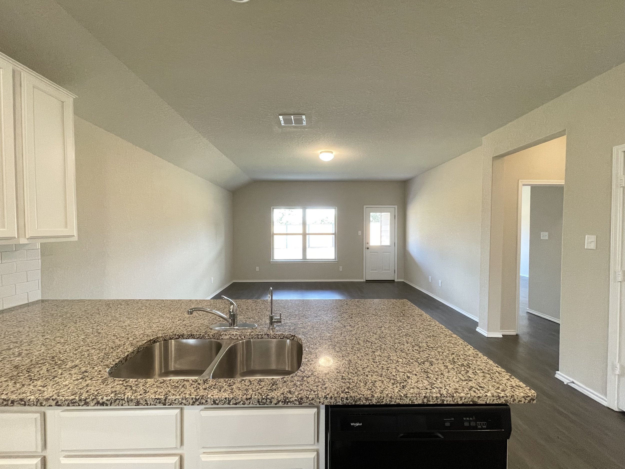 Kitchen overlooking living room