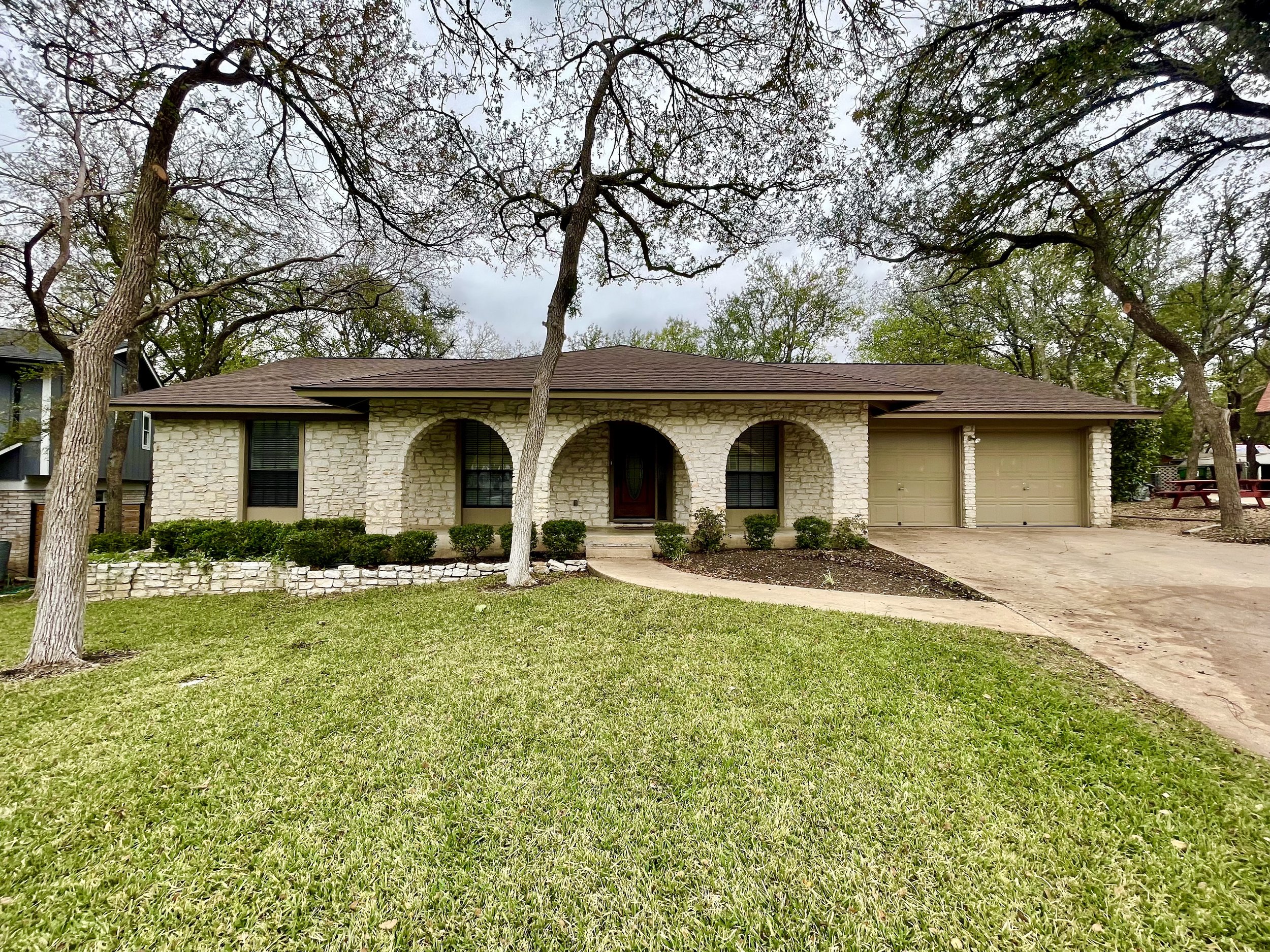 Charming 4 bedroom home with beautiful, mature trees.