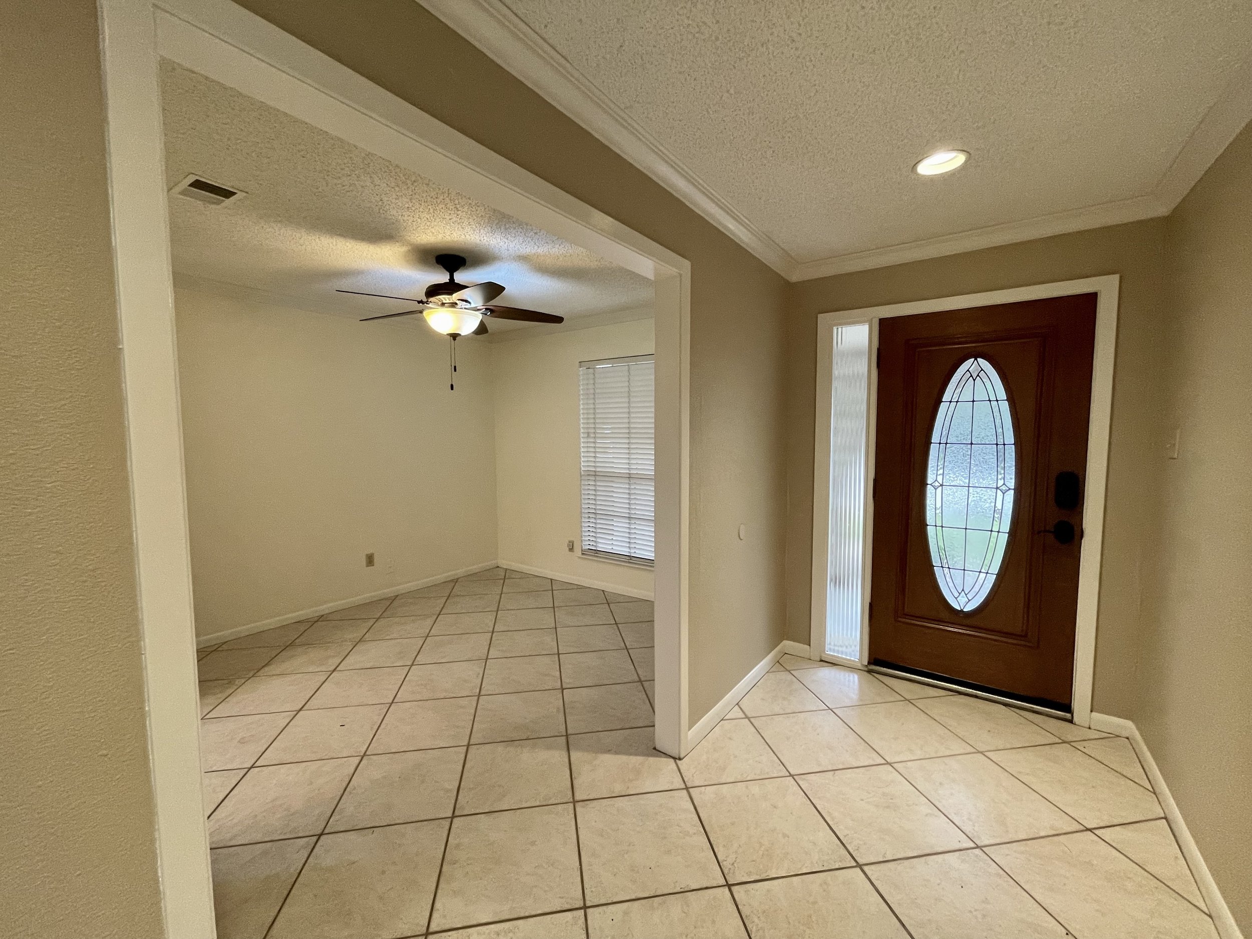 Front entry and dining/ flex space.