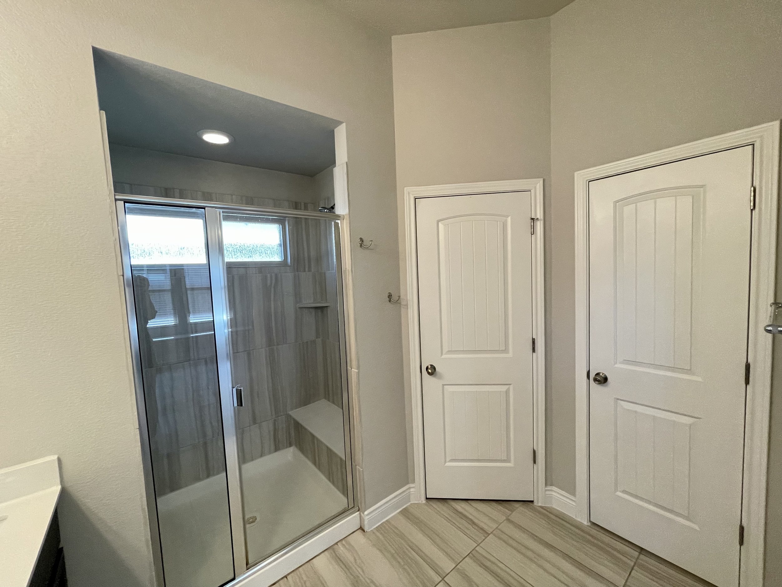 Luxurious shower in primary bathroom.