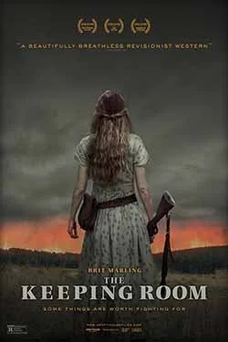 A woman with long hair in a dress holding an axe, facing away, standing in a field during sunset, with a dark cloudy sky behind her, on the cover of the movie 'The Keepin Room'.