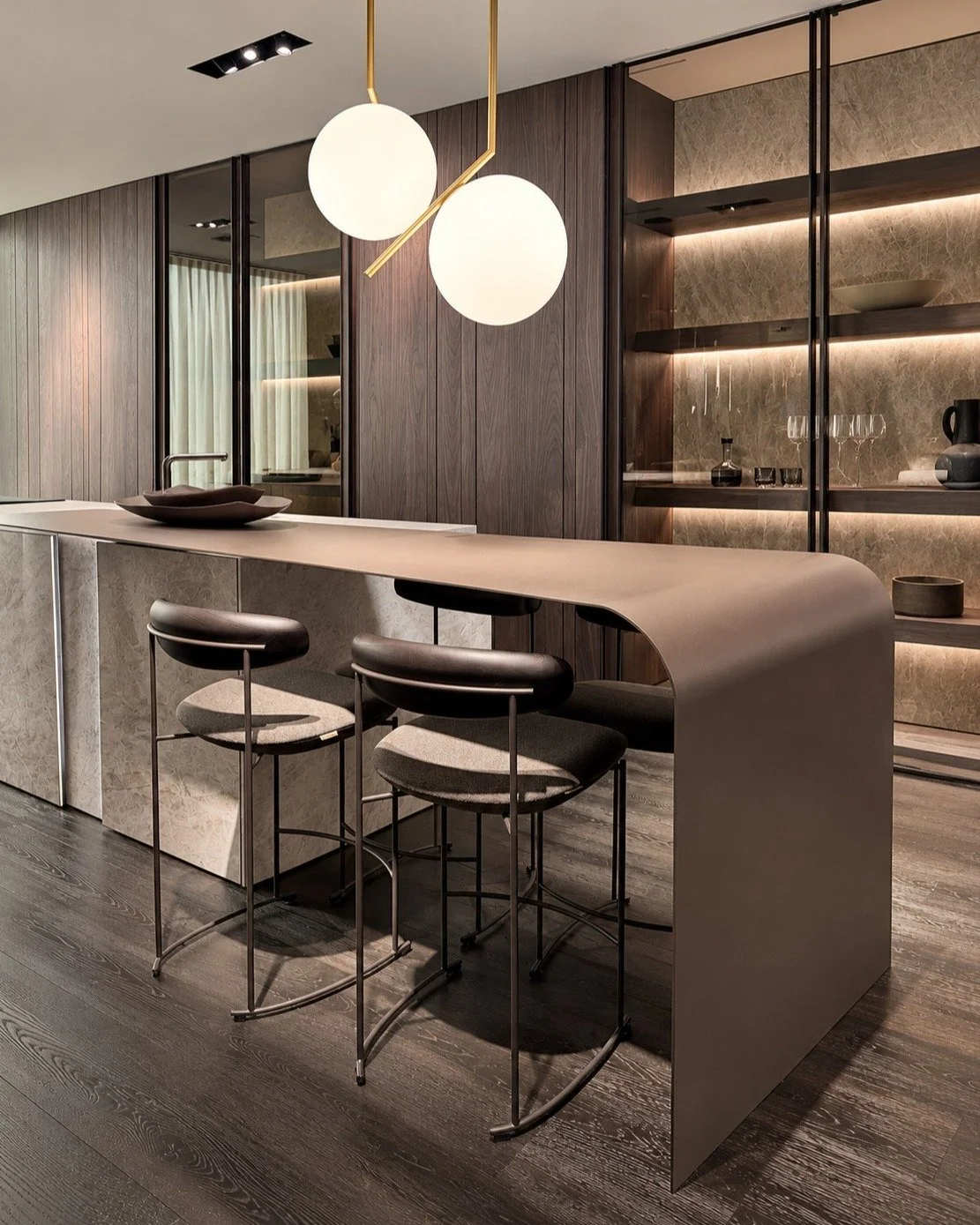 When I visit Milan Design Week, I photograph a lot of beautiful spaces, but these are the things I find myself going back to: a stone surface that conceals storage, a tiny light integrated into a shelf, an unexpected edge detail, a door that almost d