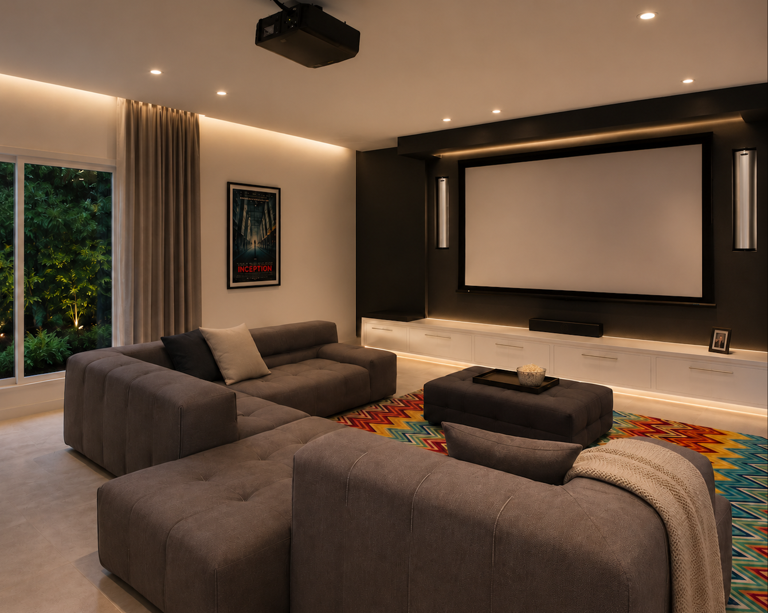 Home theater with dark walls, large projection screen, modular seating, and colorful rug