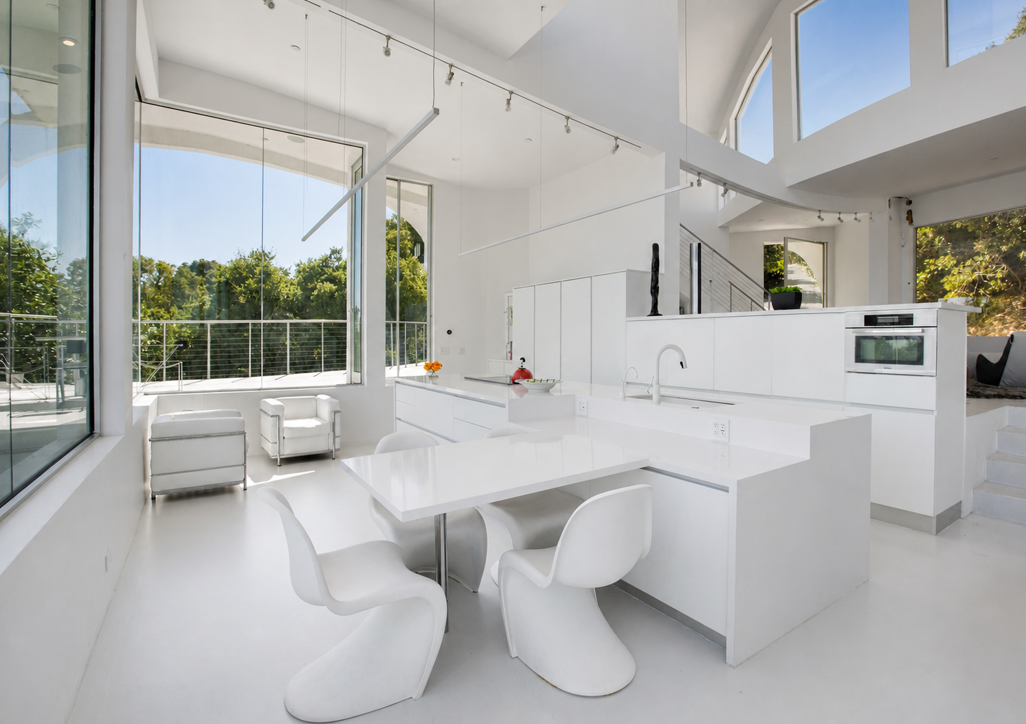Isolina Mallon Inetriors white kitcehn view table.png