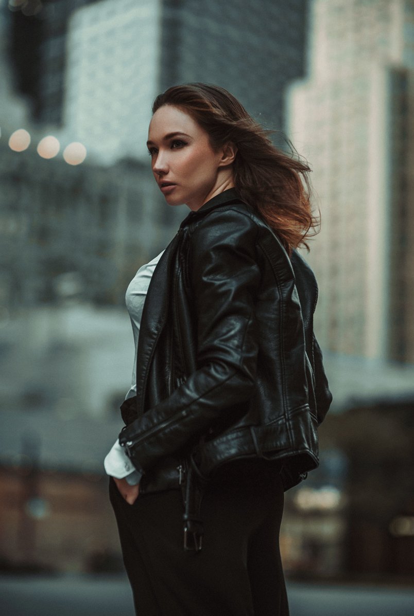 City portrait in a black leather jacket