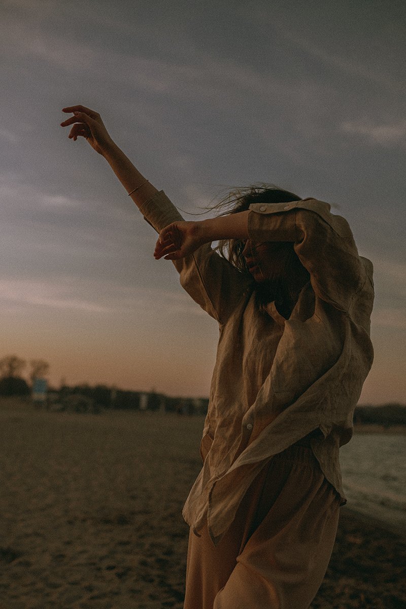 An expressive gesture in soft evening light