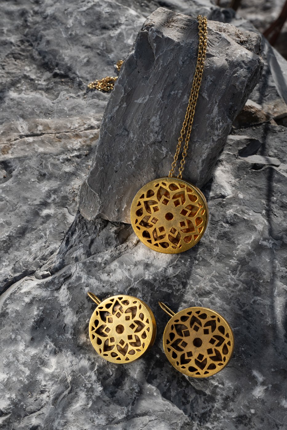 Geometric gold jewellery photographed for a commercial campaign