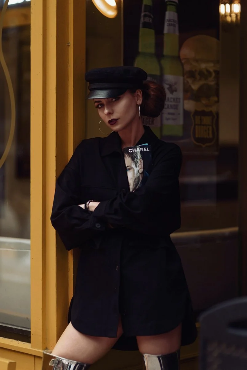 Urban Toronto lifestyle portrait against a yellow storefront