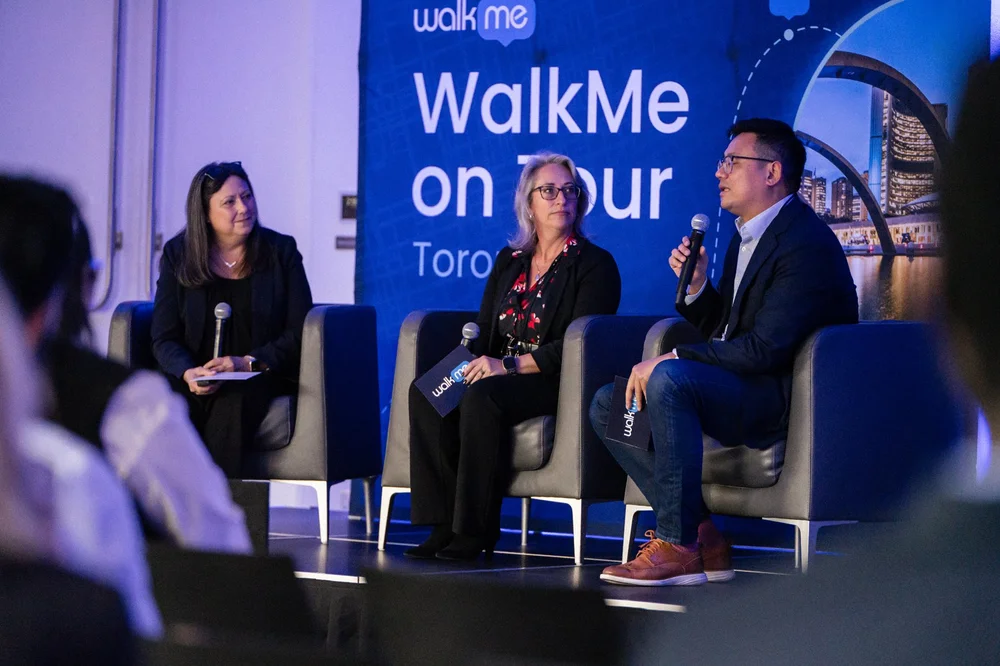 Panel discussion photographed at a Toronto corporate event