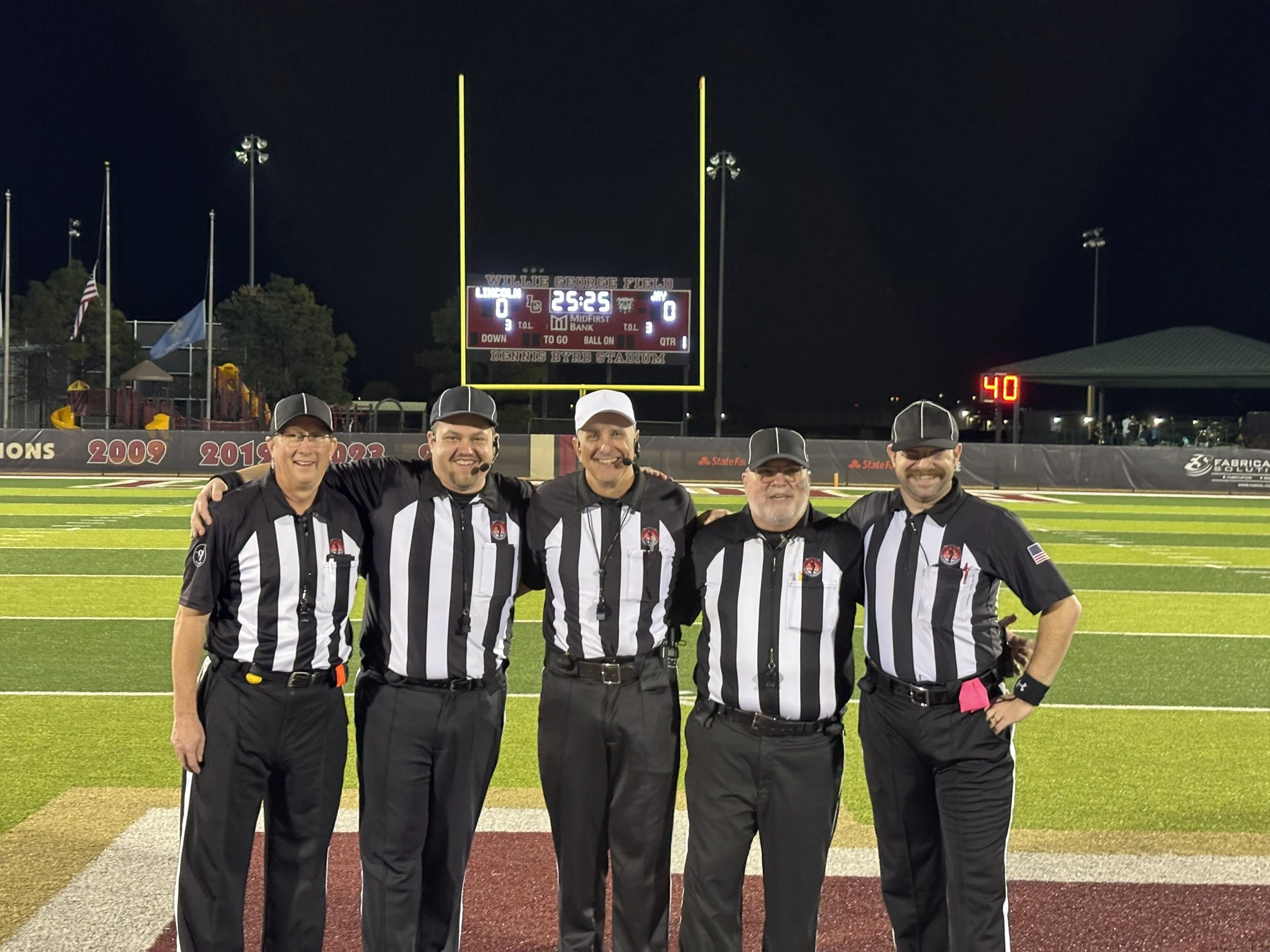 Dan Bewley (first on the left) preparing to officiate an Oklahoma High School football game in Tulsa.