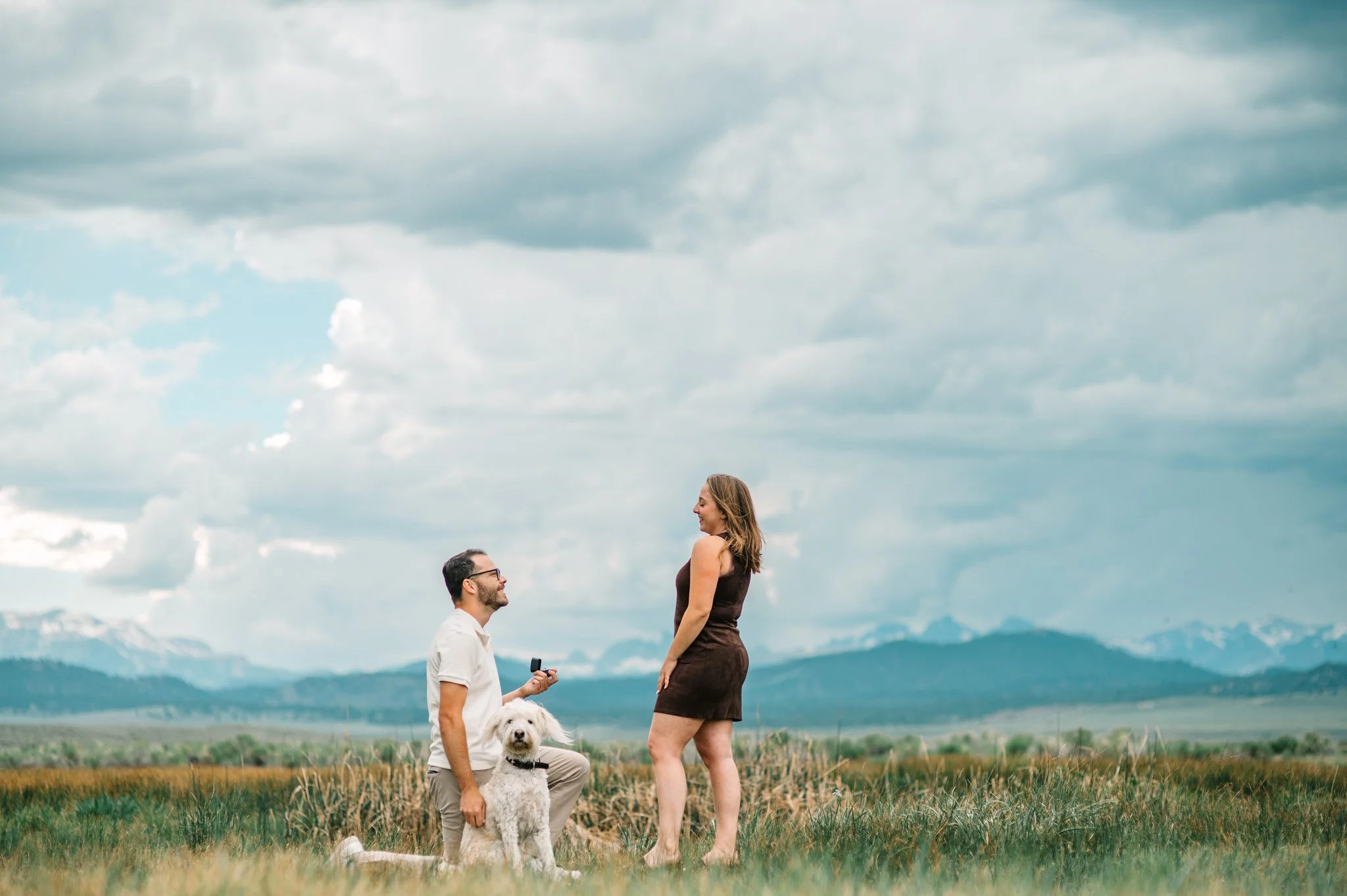 photo of a man proposing to a women near owens river in mammoth lakes
