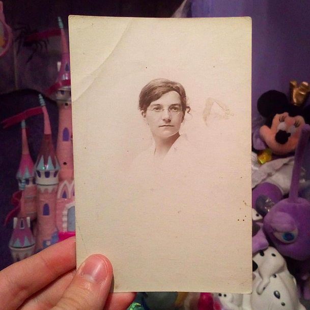 Faded photo of woman in glasses, late 19th Century