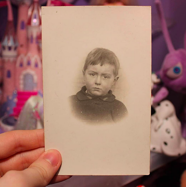 Grumpy boy, early 20th Century