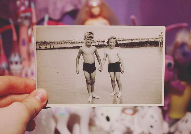 Two kids on the beach, 50s