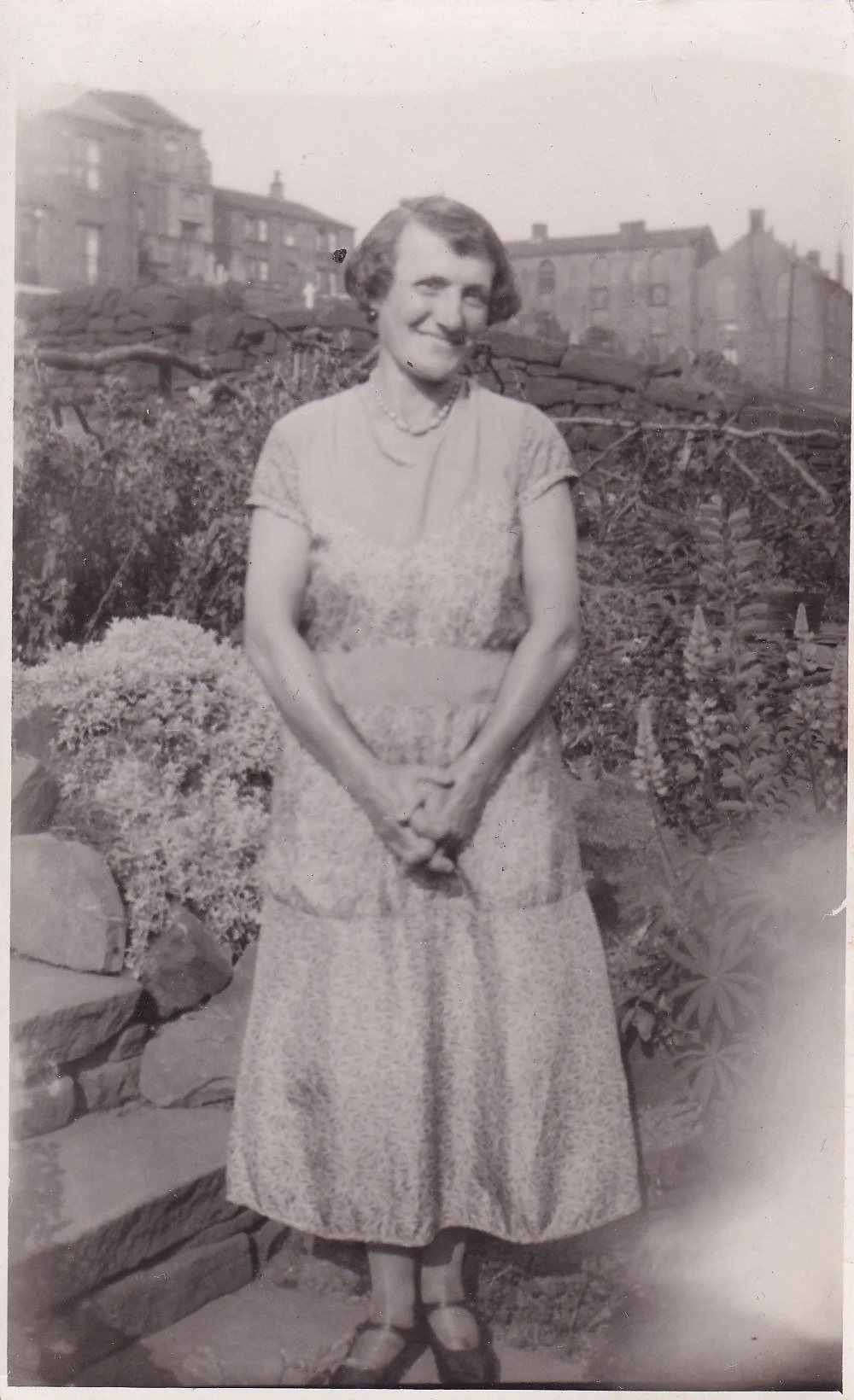 Woman in handmade dress, 40s