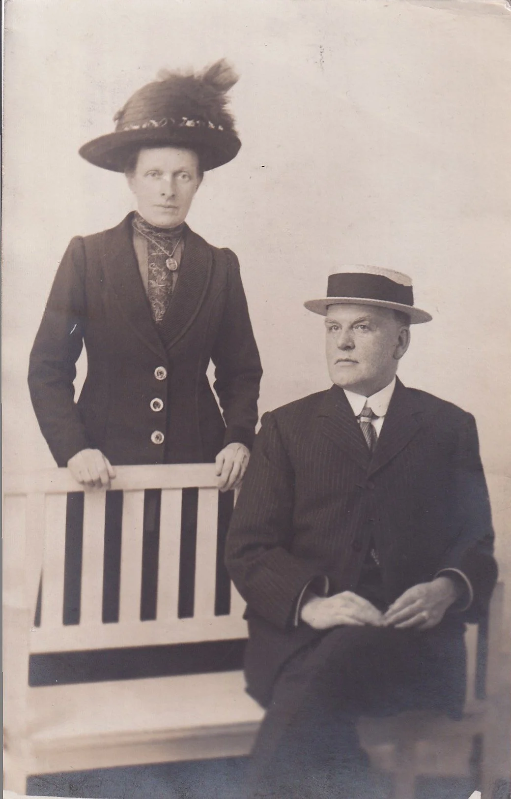 Pair in stylish hats, early 20th Century.