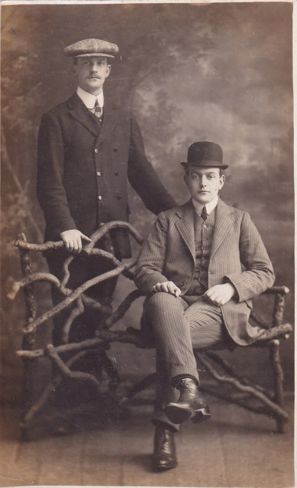 Two smartly dressed gentlemen, early 20th Century.
