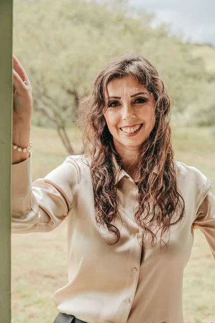 Tiara Rodriguez is smiling at the camera
