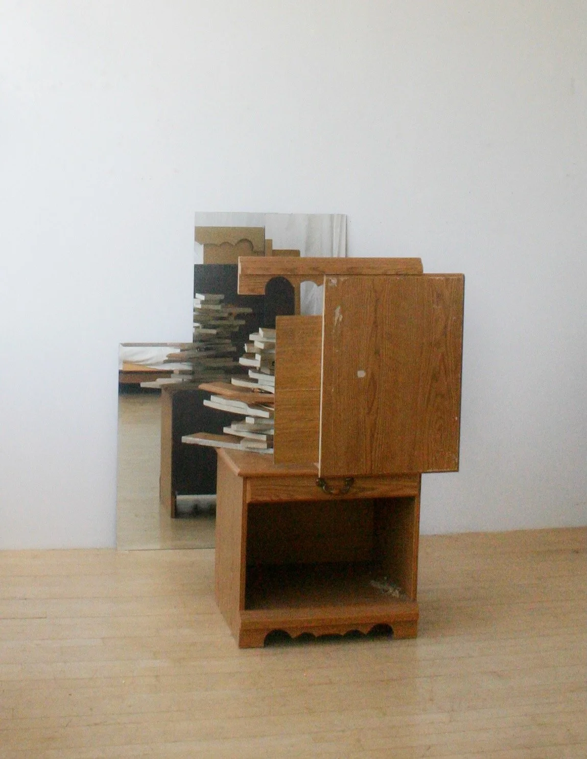 n Rome: Pair and Double, 2010. 
Two end tables reconfigured.  Laminate, mirror, phosphorescent paint. 
56 x 30 x 28 inches.