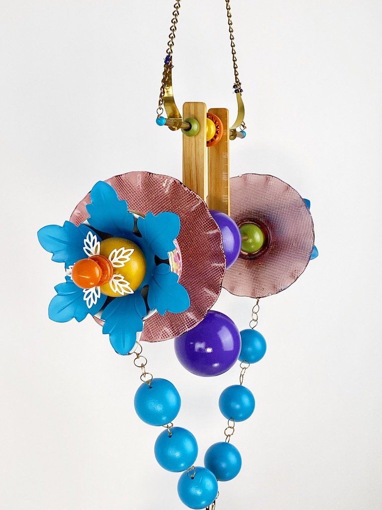 A detail shot of a handmade hanging sculpture