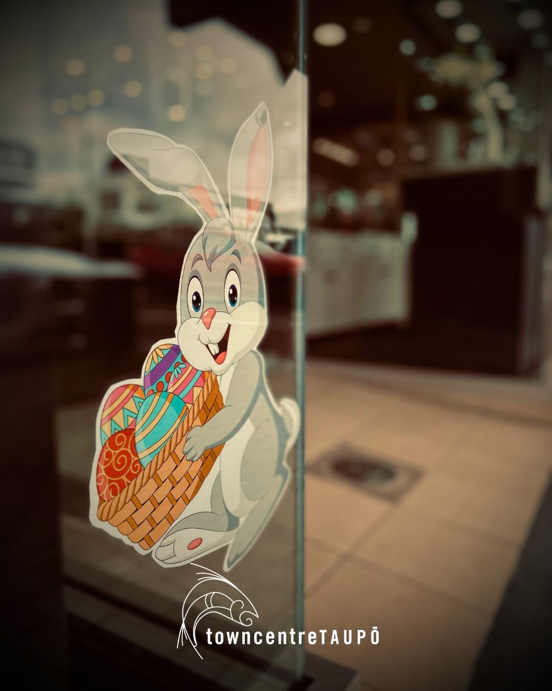 Easter Bunny Poem Hint #4:

Bunnies, bunnies all over town,
Can you find them all around?
Taupō Town Centre, you&rsquo;ll find their paw.
See at least 10 and be into the draw.

They may be high, they may be low, 
They may be&hellip;right under your n