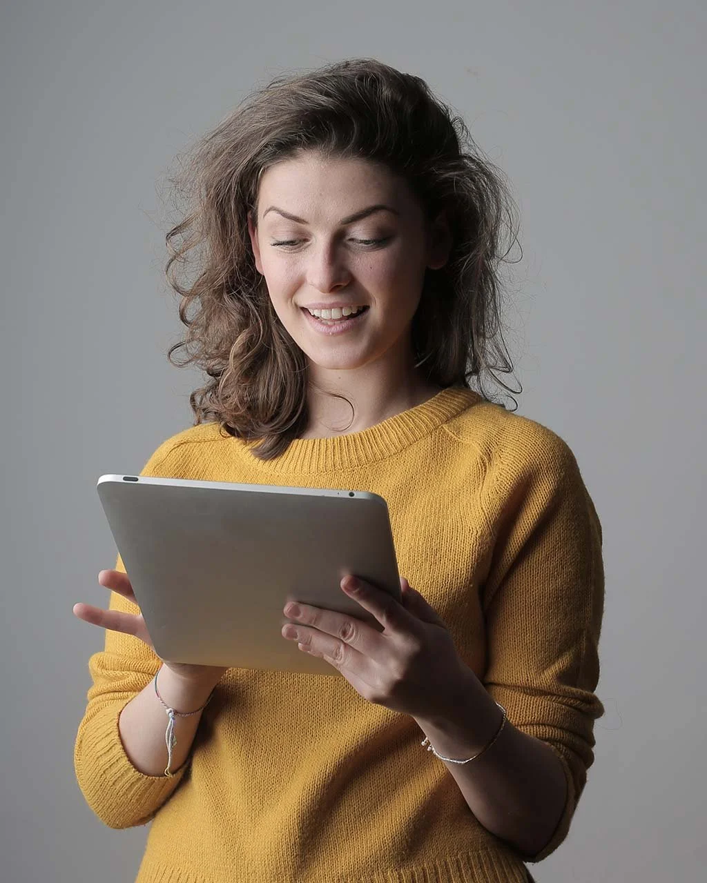 Young nonprofit professional using the Fundraising Focus Digital Planner.