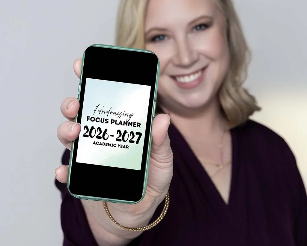 Gabie Benson showing the Fundraising Focus Digital Planner on her phone.