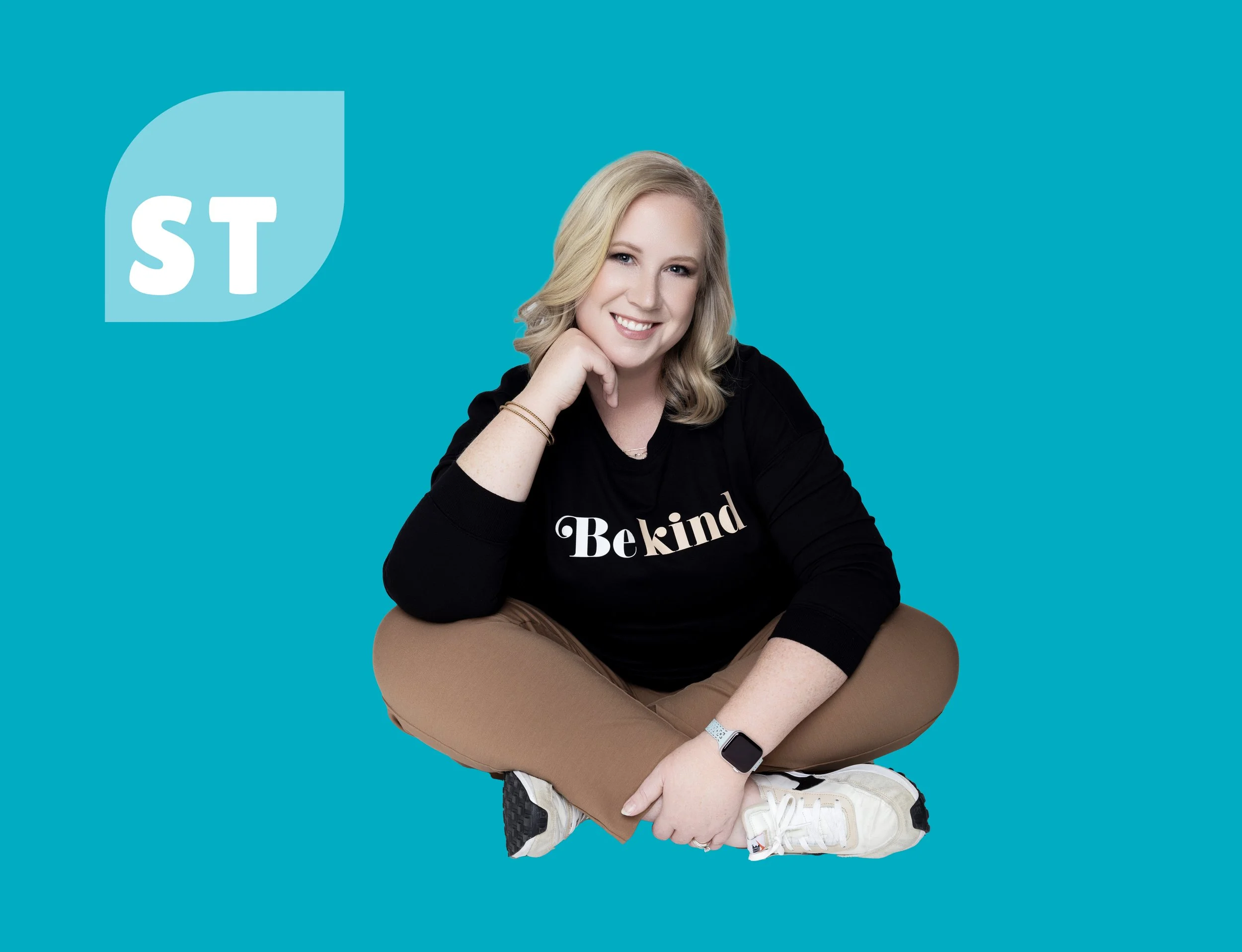 Graphic with SproutTable logo and a photo of a blonde woman sitting and smiling with a sweatshirt that says "be kind"