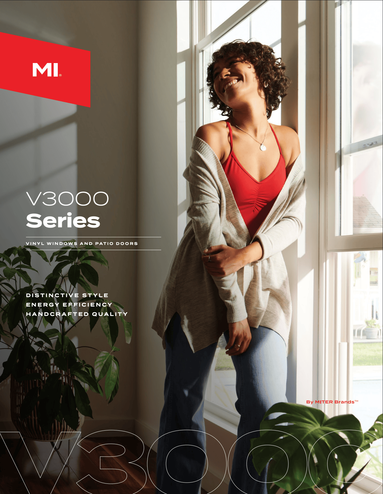 MI Windows and Doors brochure cover featuring a woman standing by a large window with sunlight streaming in, smiling, wearing a red top and gray cardigan.