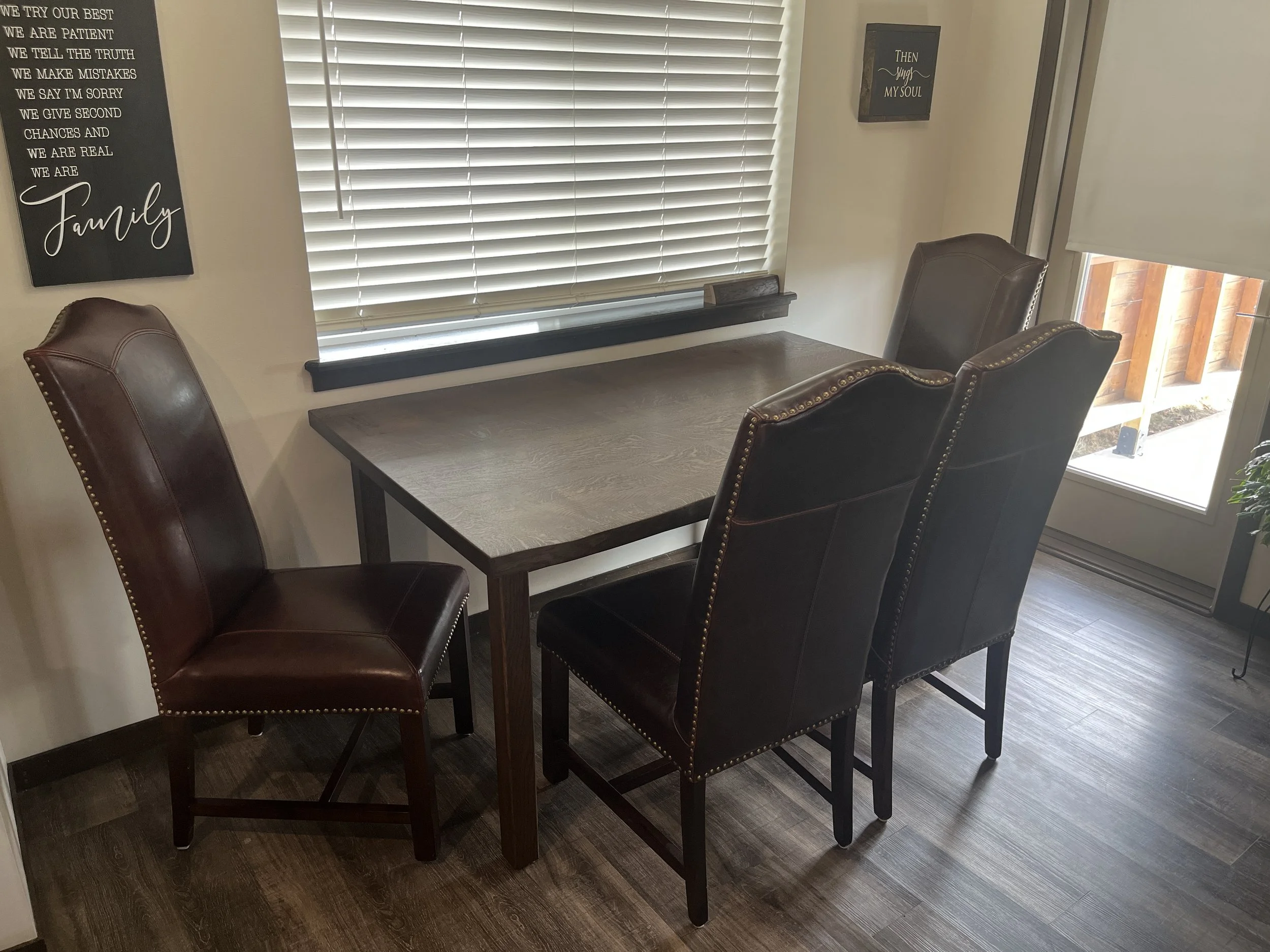 Stained Oak dining room table, handcrafted at the Kneifl Tymber Wood Shop