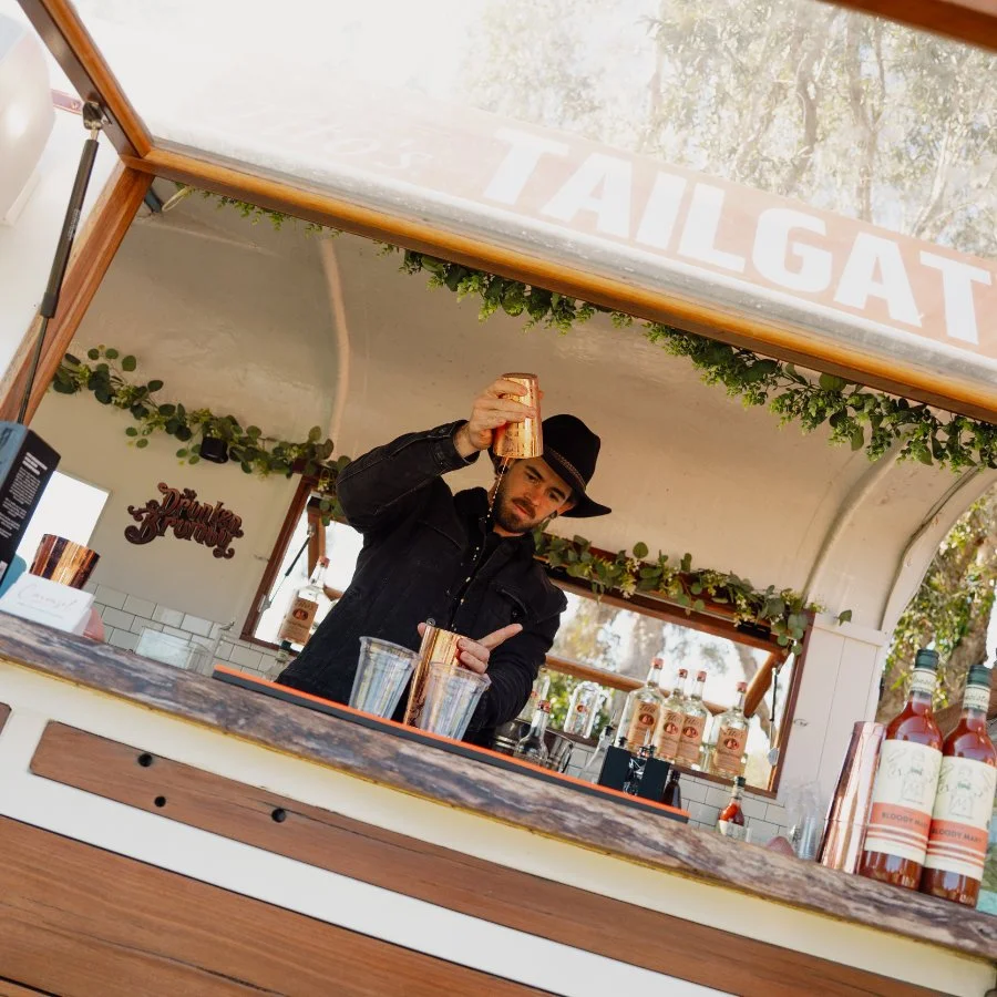 Horse float mobile bar serving cocktails at an outdoor event