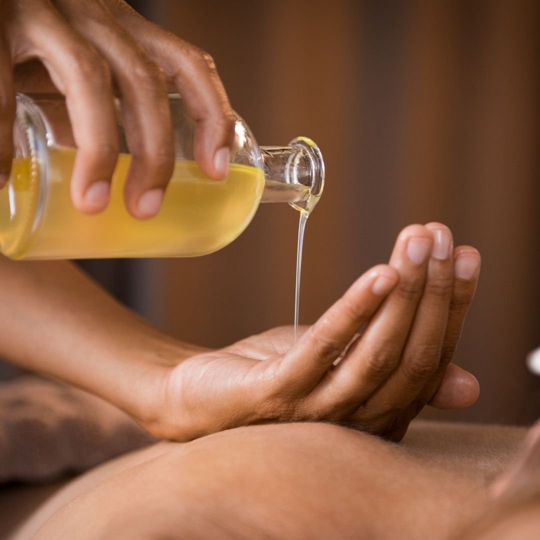 Vitamin E hydrating oil used to finish a salt scrub and mud wrap treatment at The Salt Center in Alpharetta, GA